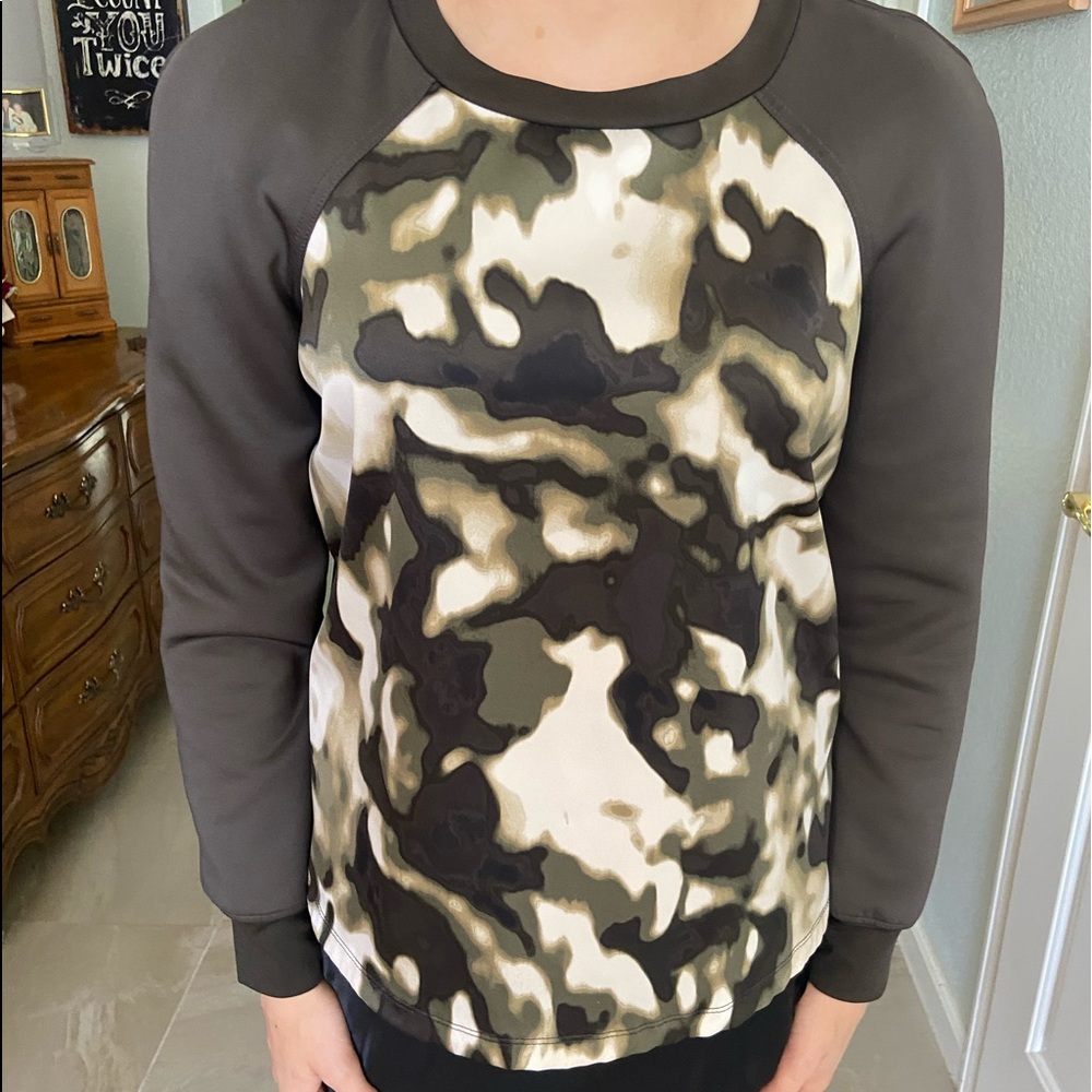 Green and white blouse